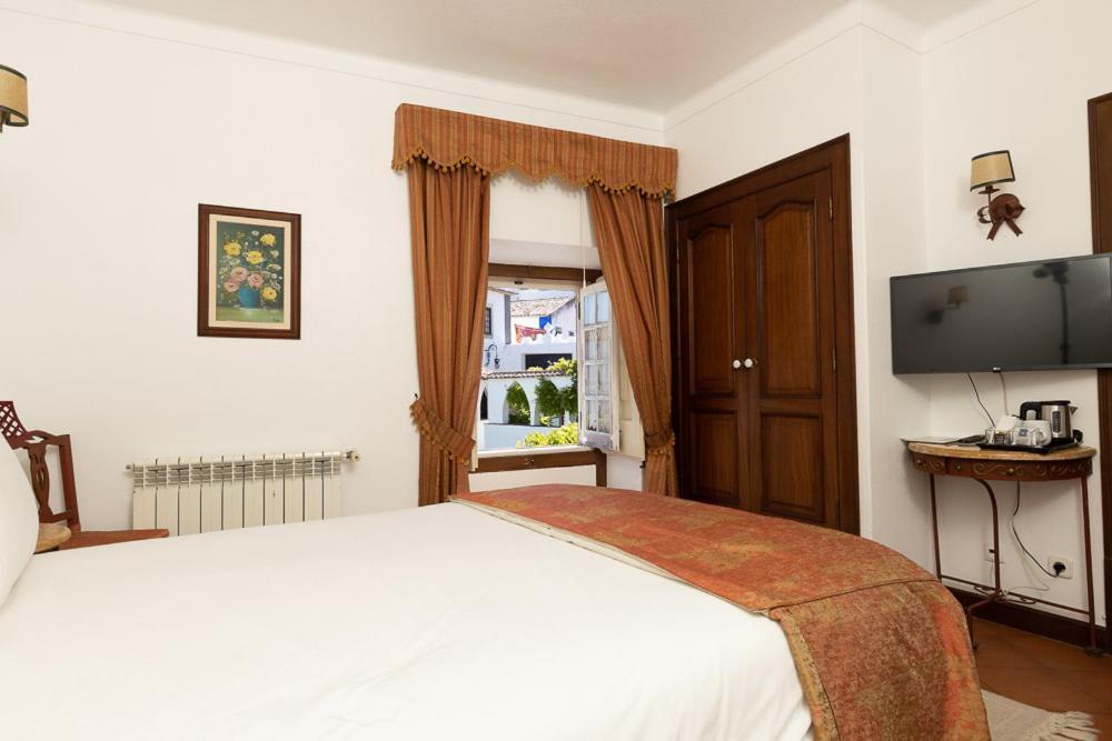 Casa De S. Thiago Do Castelo Hotel Obidos Bagian luar foto
